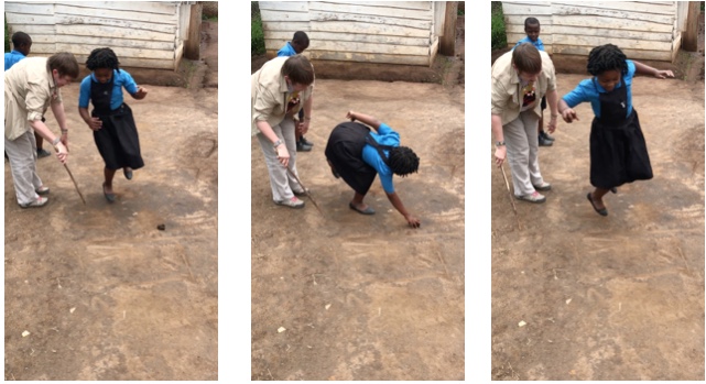 teaching Uphill children to play hop scotch