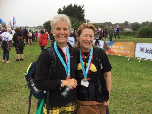 uphill kiltwalkers with medals