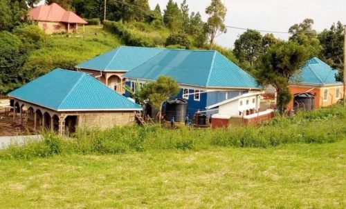 uphill site with two new classroom blocks