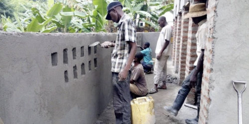 Plastering the latrine