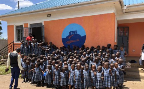 uphill junior school pupils in new uniform outside the administration block