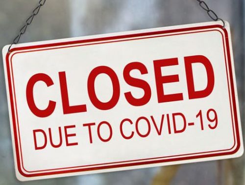 closed due to COVID sign