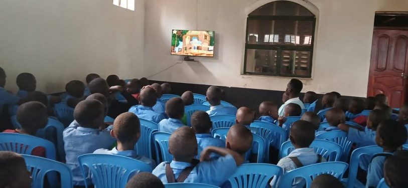 satellite TV installed in new school hall where all the pupils can enjoy programmes to help their language skills