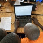IT skills lesson at uphill junior school in rural uganda
